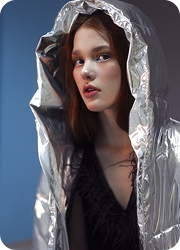 Fashion model in dark outfit